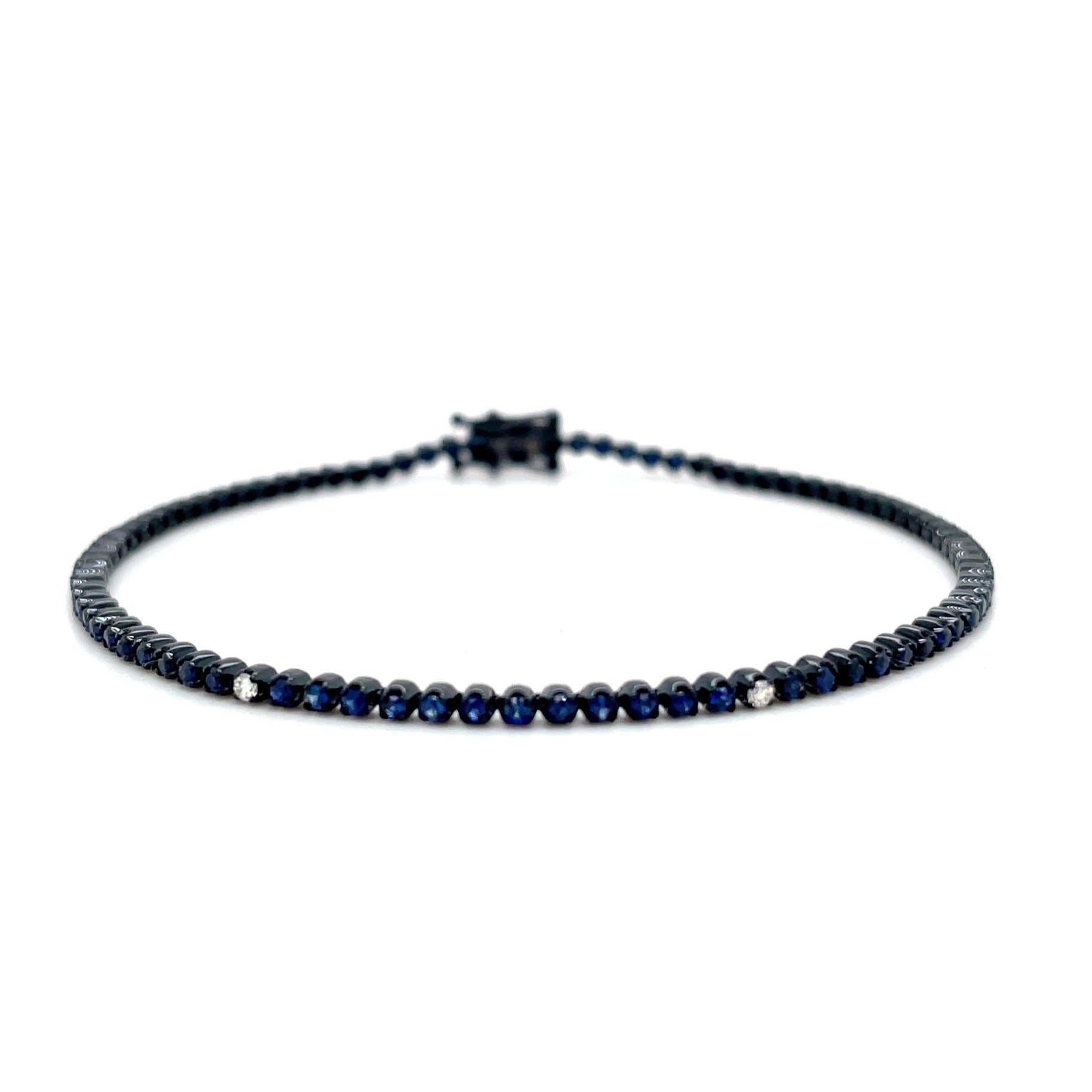 18kt witgouden zwart gerhodineerde tennis armband bezet met saffier en diamant