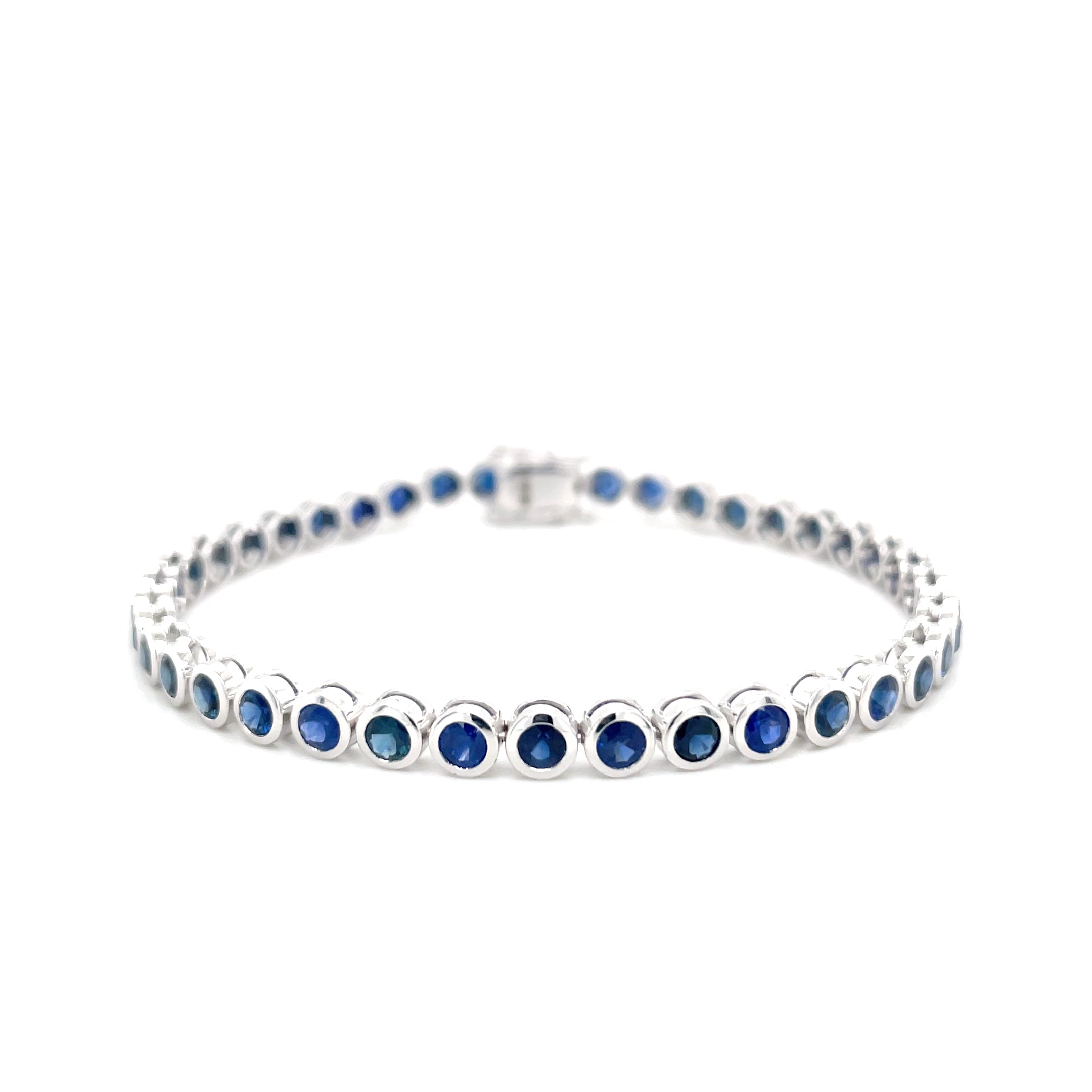 18kt witgouden tennis armband bezet met blauwe saffier