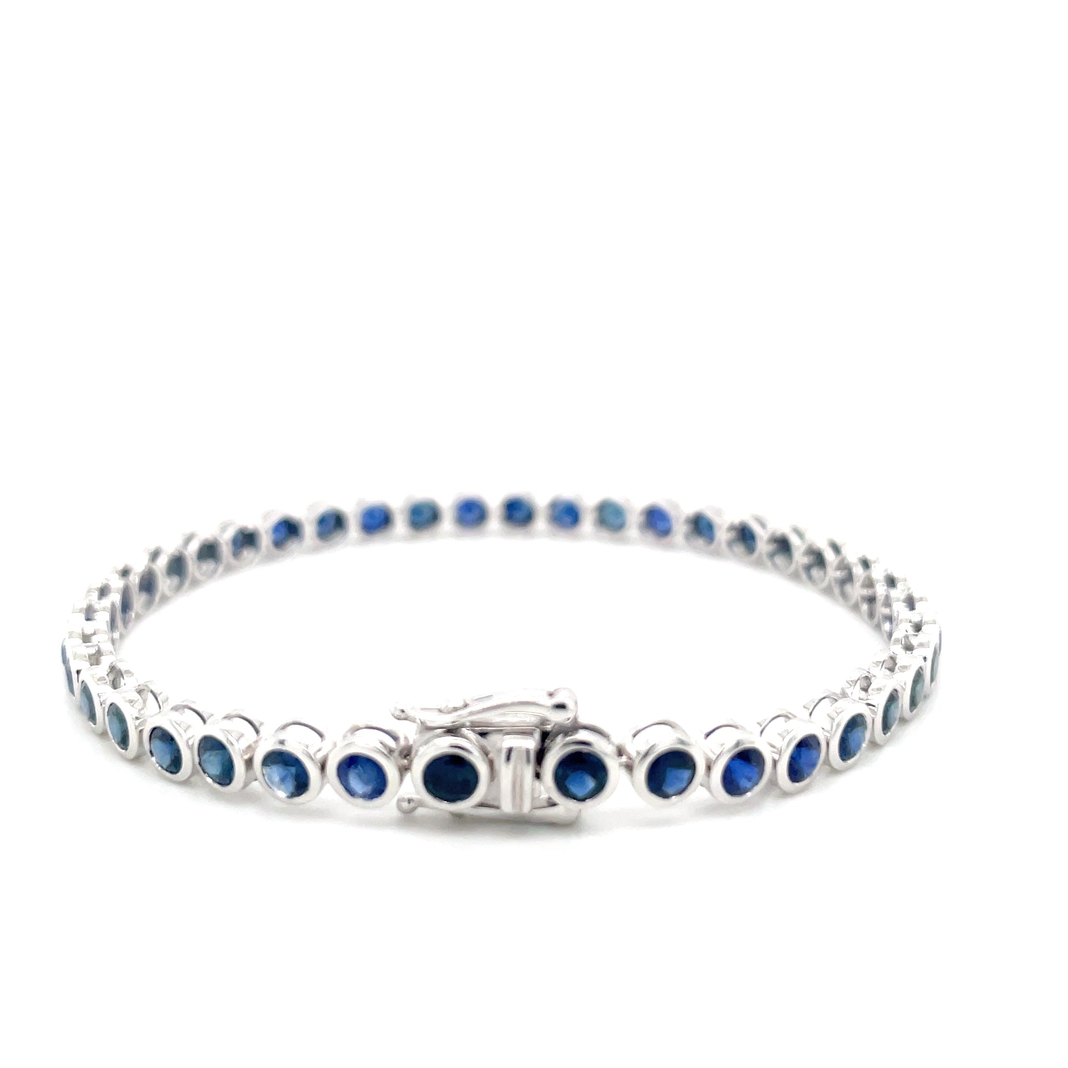 18kt witgouden tennis armband bezet met blauwe saffier