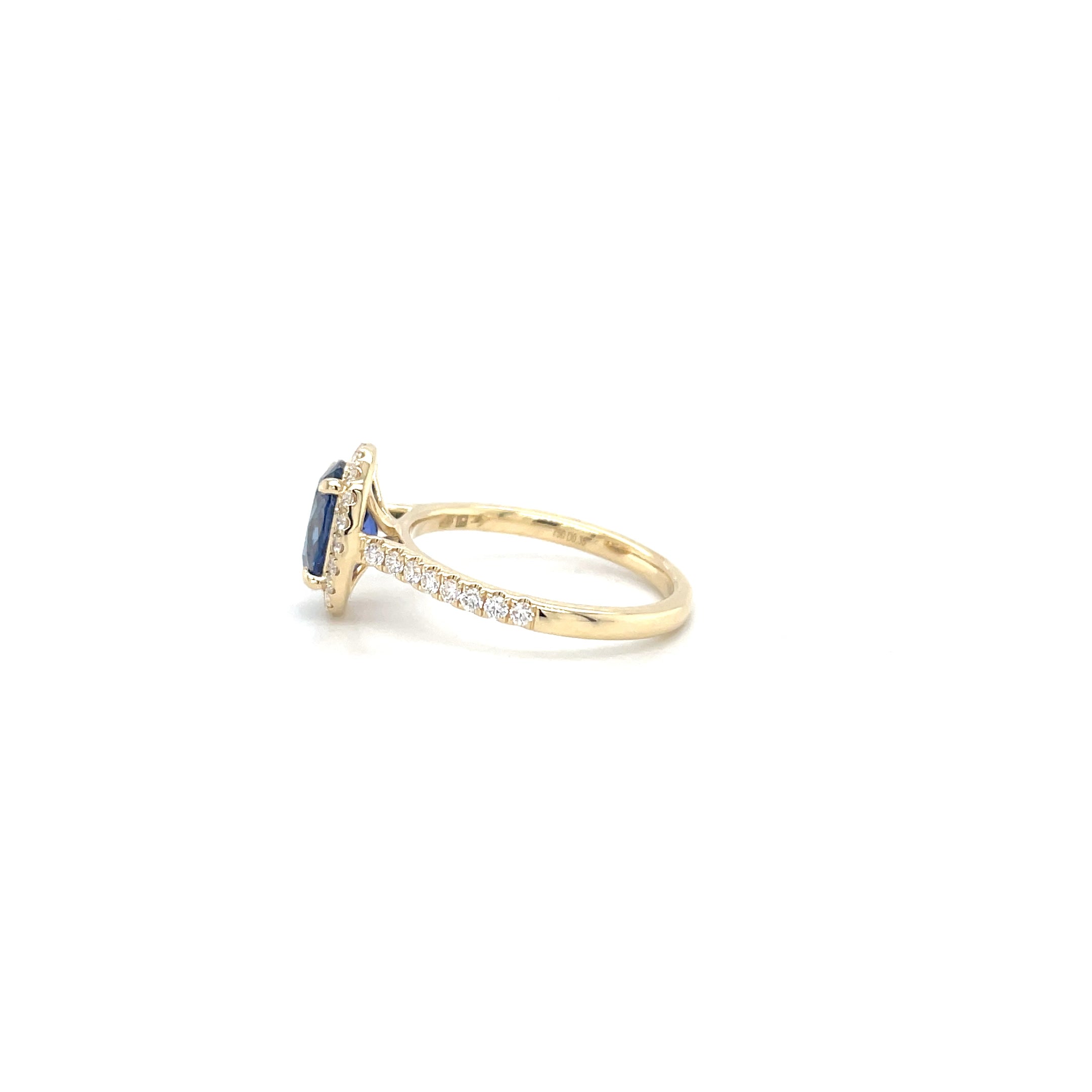 18kt geelgouden halo ring bezet met saffier en diamant