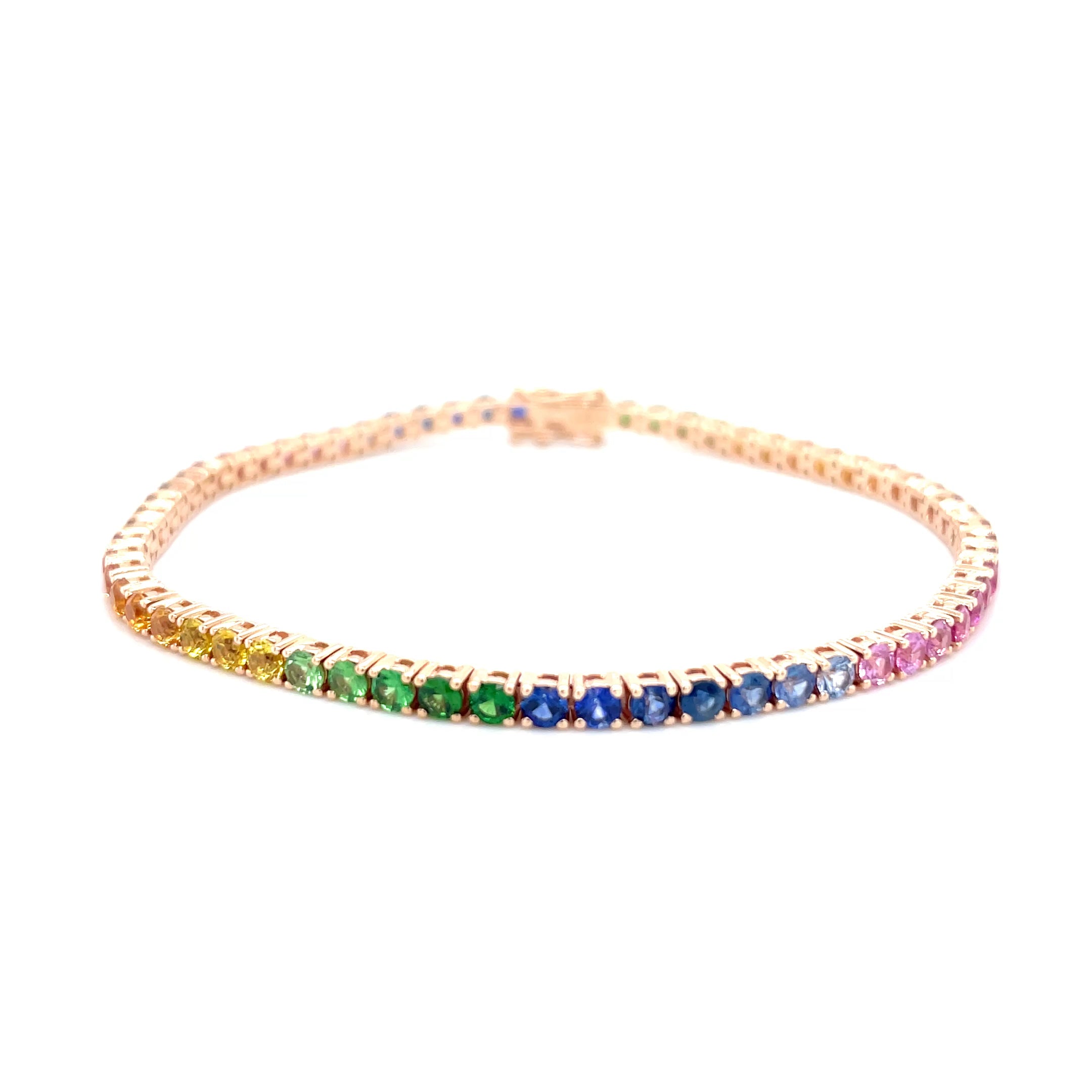 18kt rosegouden tennis armband bezet met regenboog saffier