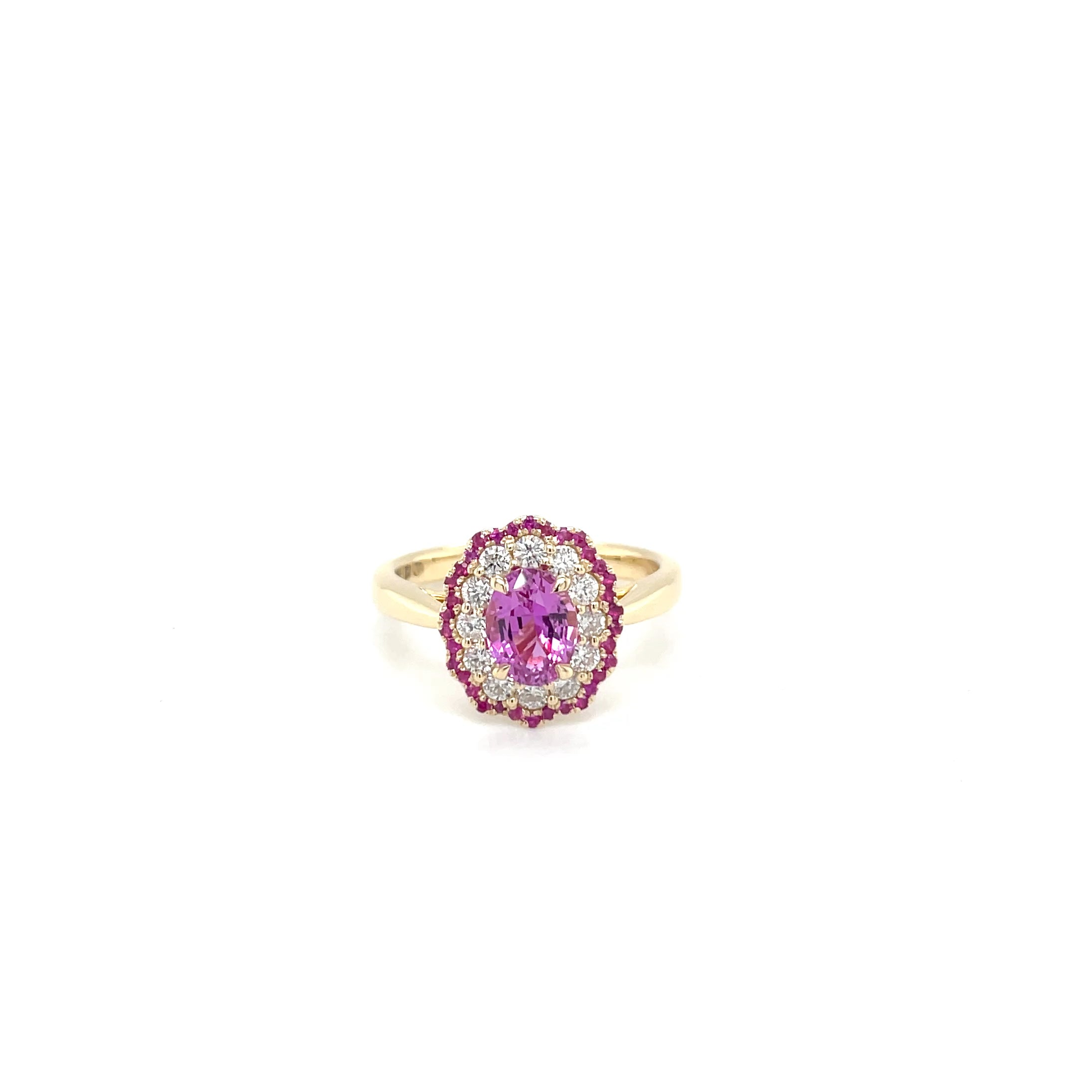18kt geelgouden ring bezet met een roze saffier, diamant en robijn.