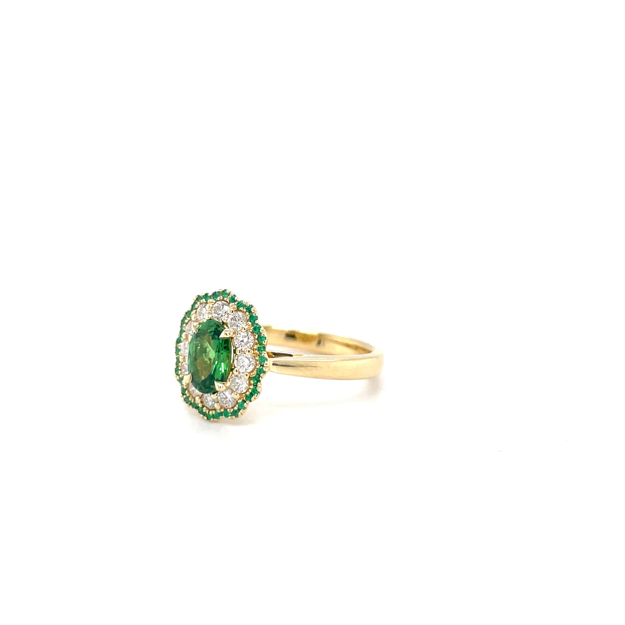 18kt geelgouden ring bezet met tsavoriet, smaragd en diamant.