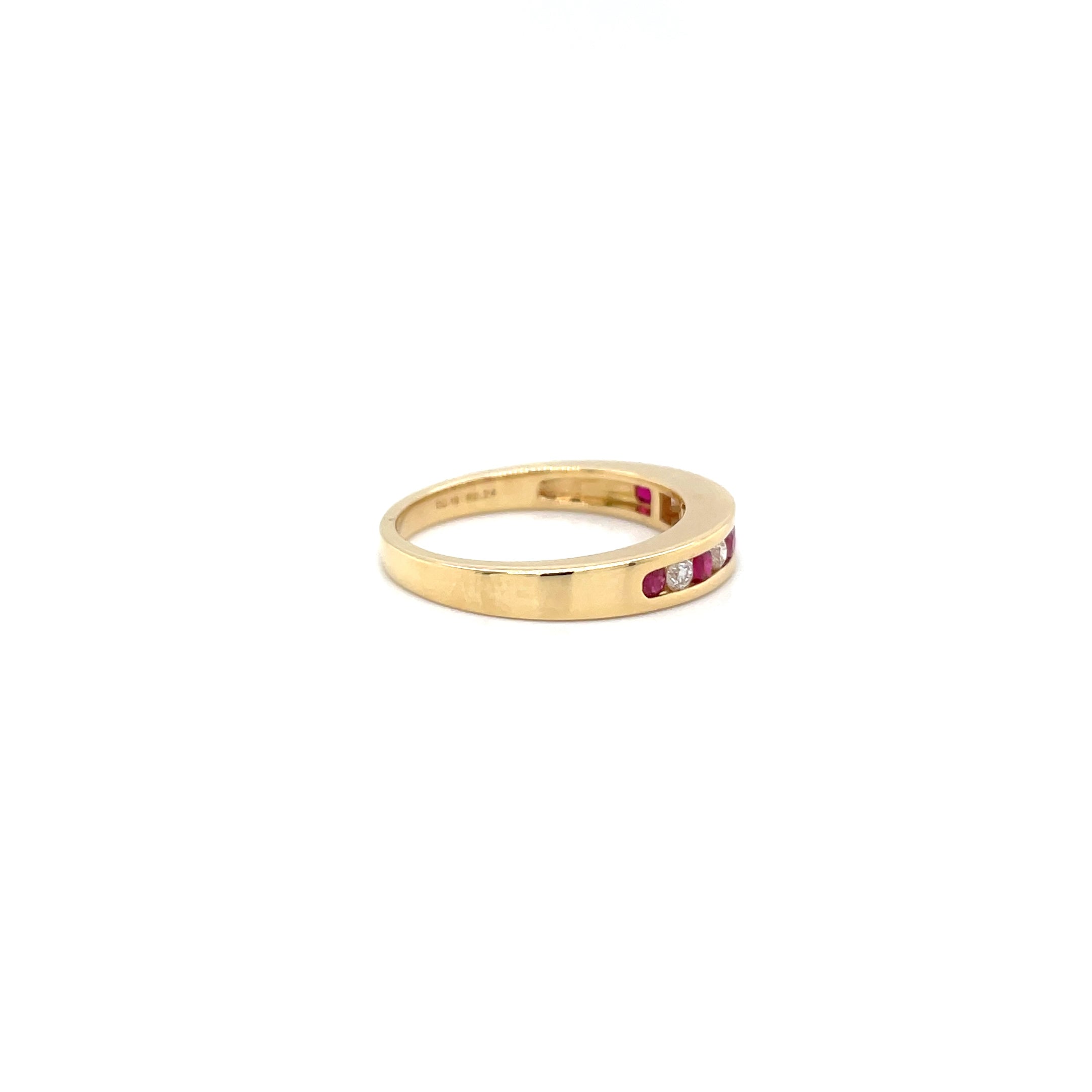 18kt geelgouden rails ring bezet met robijn en diamant