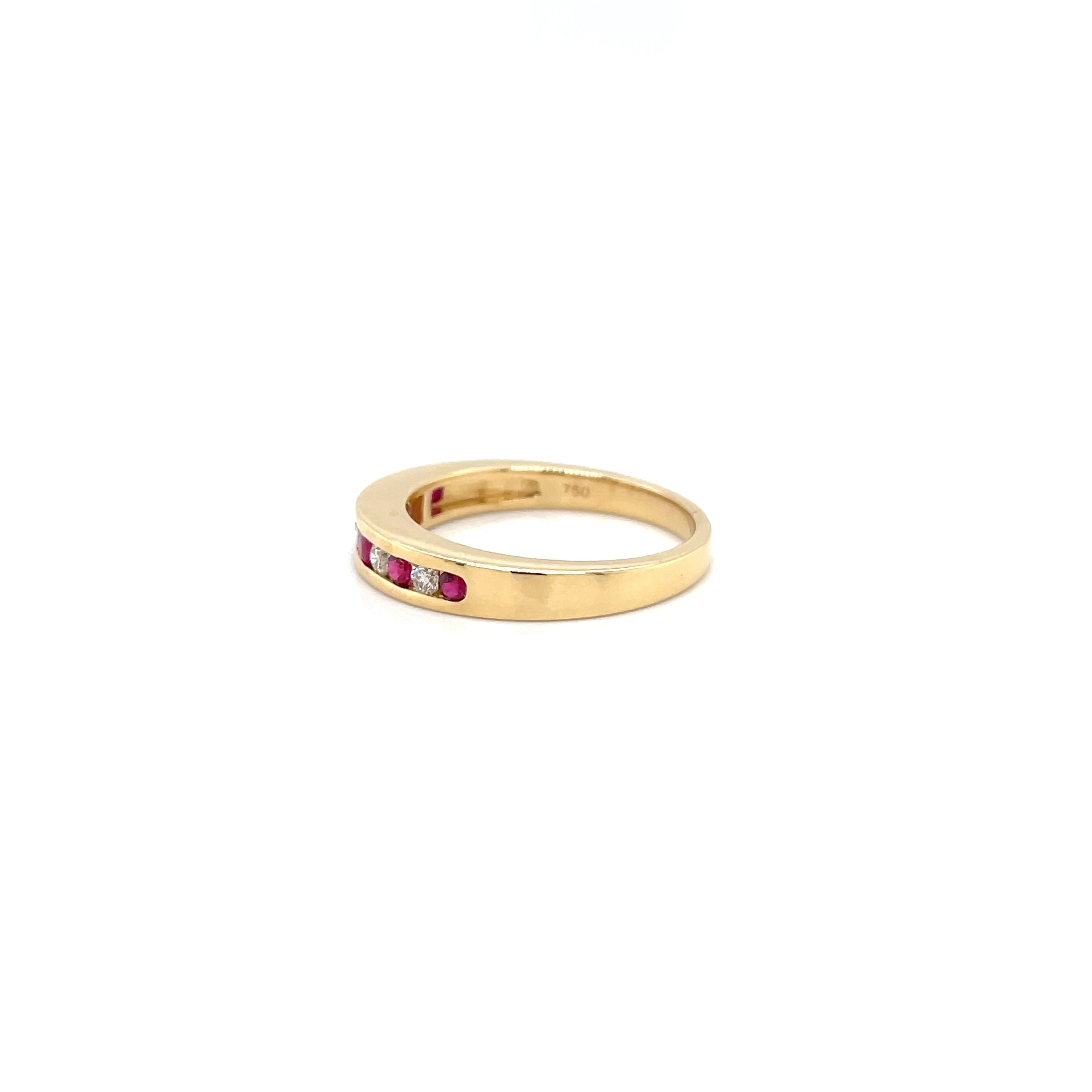 18kt geelgouden rails ring bezet met robijn en diamant