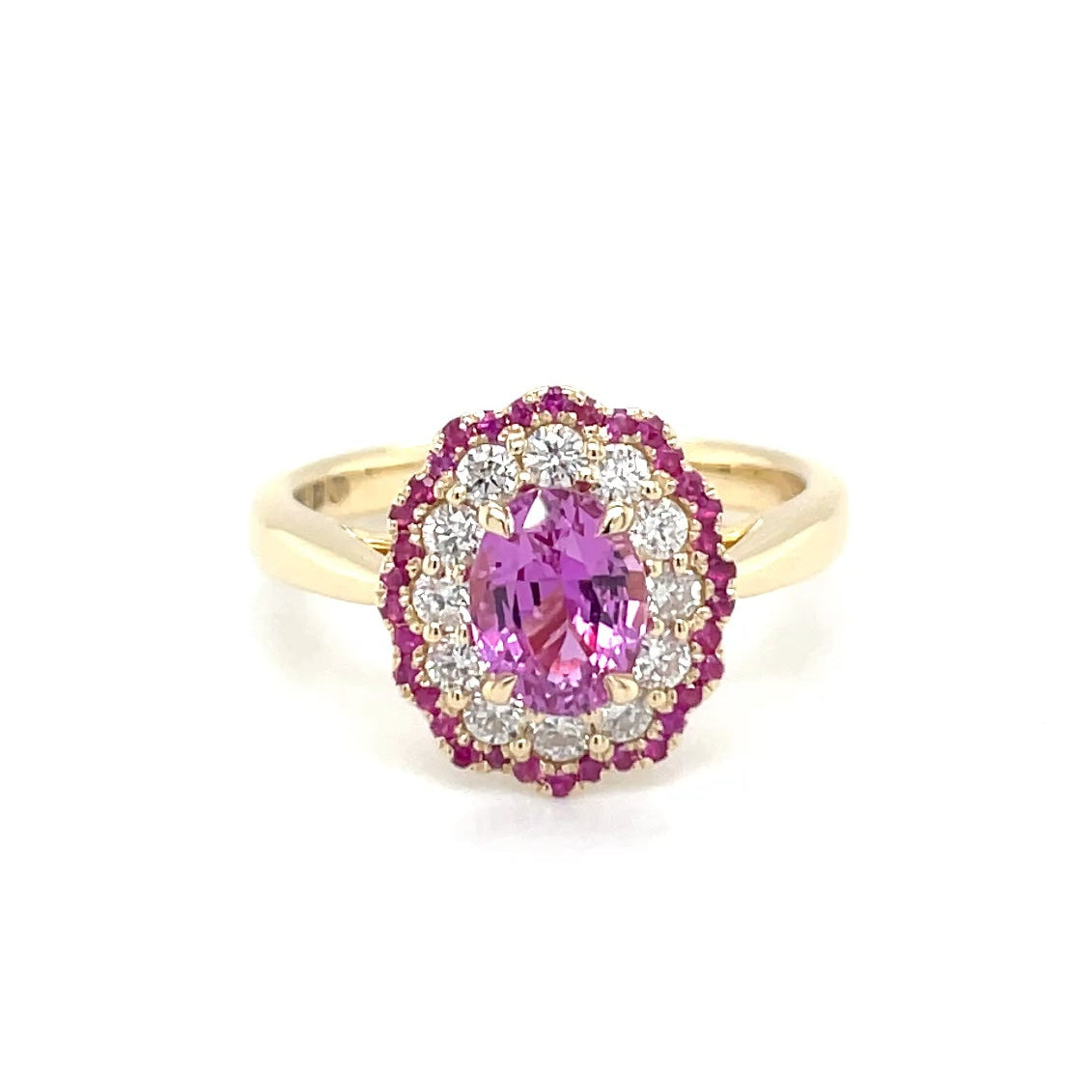 18kt geelgouden ring bezet met een roze saffier, diamant en robijn.