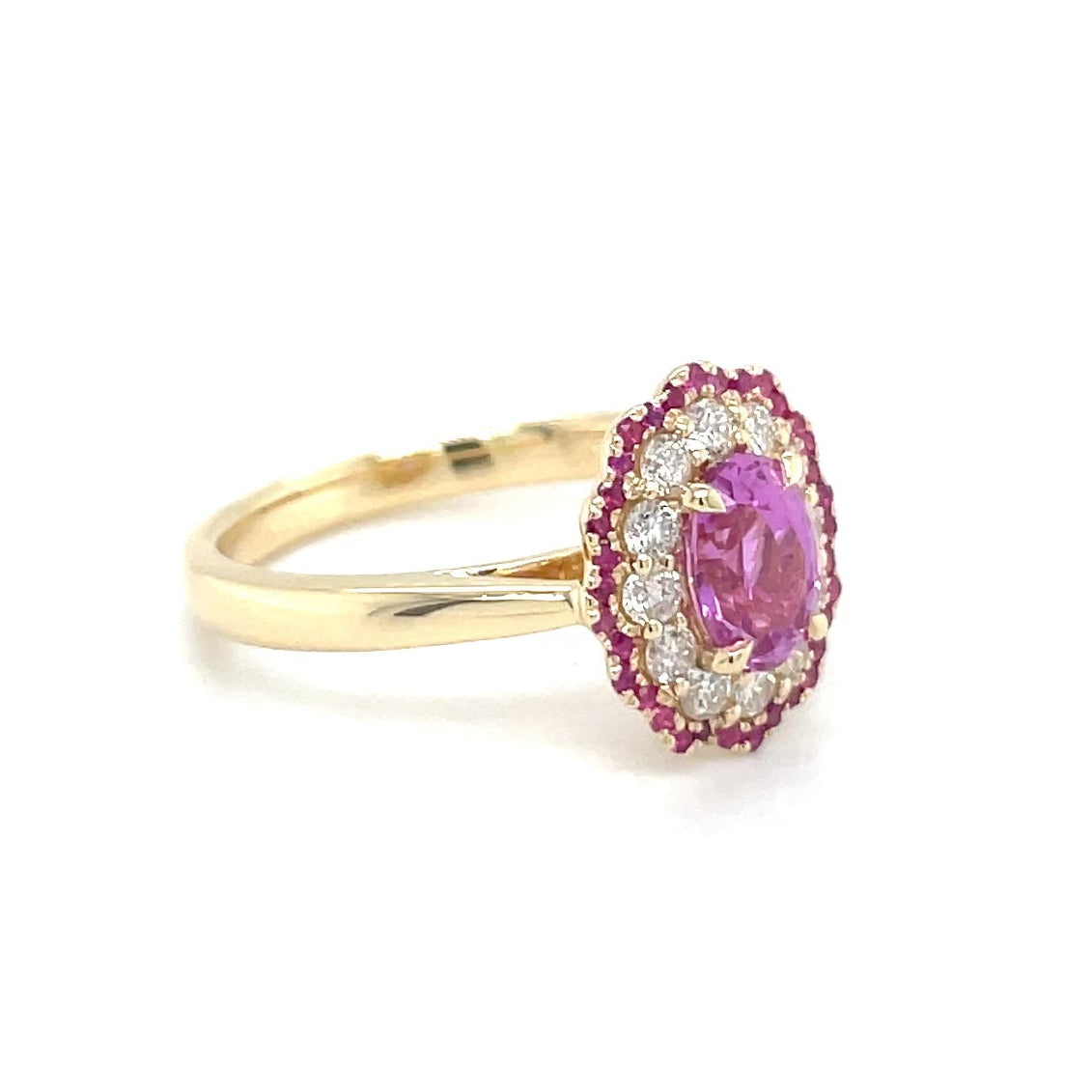 18kt geelgouden ring bezet met een roze saffier, diamant en robijn.