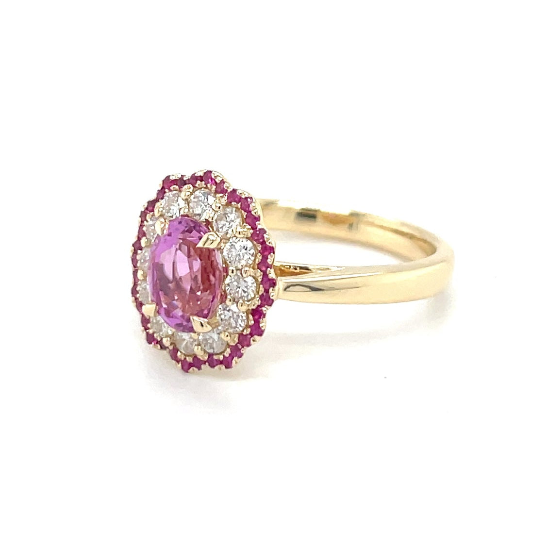 18kt geelgouden ring bezet met een roze saffier, diamant en robijn.