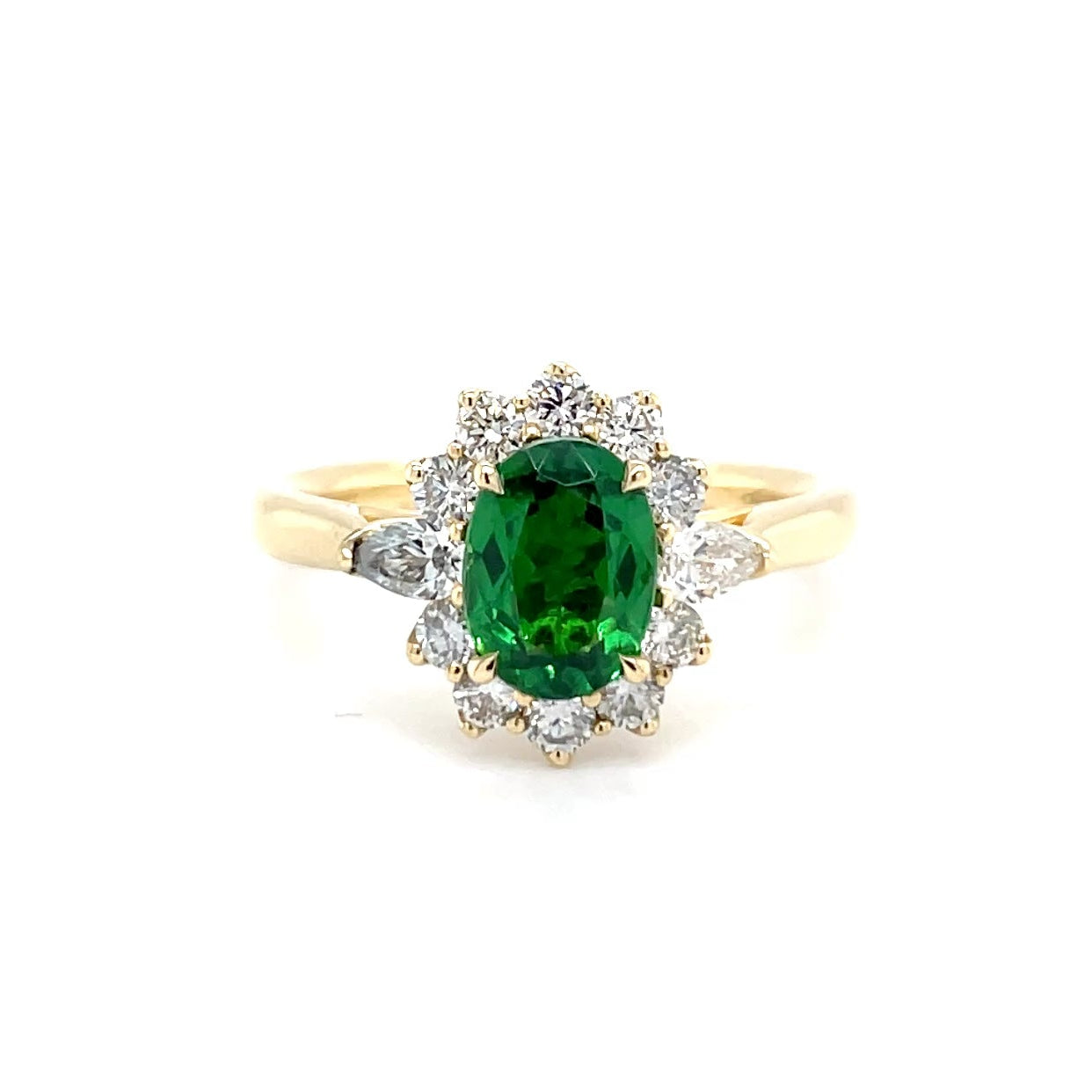 gouden ring met donkergroene edelsteen en diamanten
