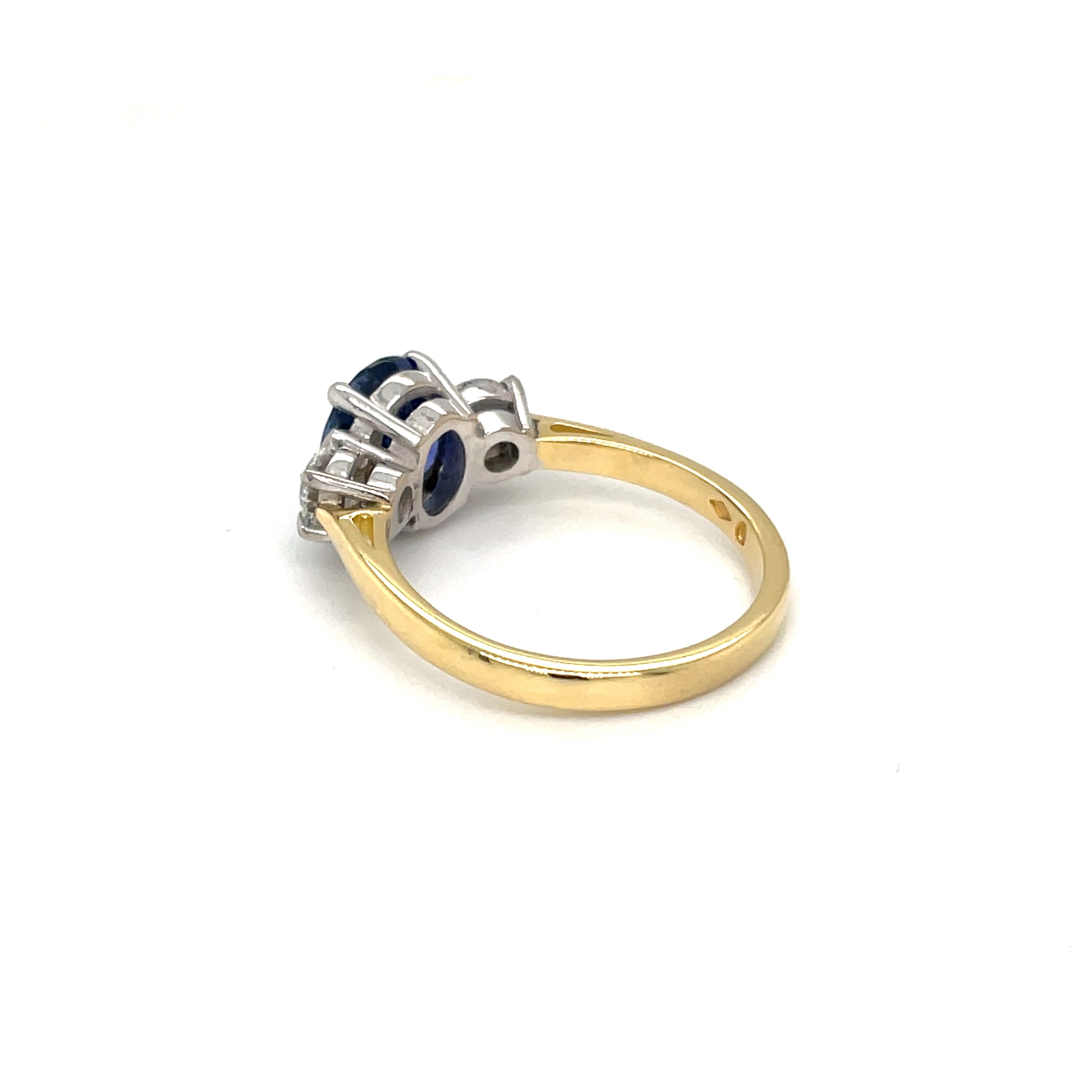 Goldring 18 K Gelb-Weißgold store mit Ceylon Saphire und 0,20ct Diamant